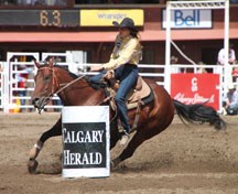 Deb Renger from the Gladys Ridge area and Shorty deftly turn a barrel Sunday at the Calgary Stampede. The duo won Sunday&#8217;s go-round with a time of 17.83.