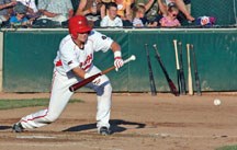 Okotoks Dawgs batter Bryce Baugh prepares to lay down a bunt during Okotoks&#8217; 2-0 loss to the Moose Jaw Miller Express on Saturday at Seaman Stadium.
