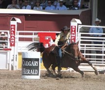 Okotoks&#8217; Deb Renger and Shorty, here at the 2011 Calgary Stampede, won the barrel racing at the Morris Rodeo in Manitoba last week. Riders from the foothills took the