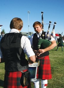 A piper and a drummer warm up at the 2010 Foothills Highland Games. This year the Games will be held on August 27 at Foothills Composite High School with fun and
