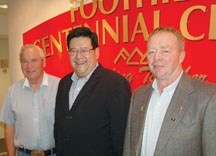 PC leadership candidate Gary Mar, centre, accepts the endorsement of Highwood MLA George Groeneveld, left and Livingstone-Macleod MLA Evan Berger.