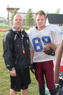 Foothills Falcon coach Bill Toso and his son, Falcons&#8217; defensive captain Dallas. Bill was a member of the Falcons&#8217; first football team back in 1985.