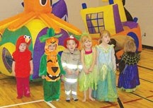 A colourful cast of tiny party goers attend a Halloween Mini Monster Bash at the Okotoks rec centre. The popular event returns Friday Oct. 28 to the Okotoks Recreation Centre.