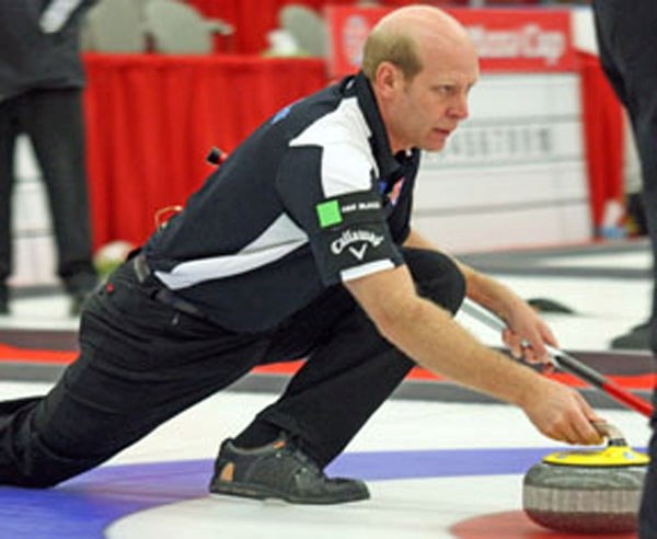 Olympic champion Kevin Martin comes out of the hack at the Alberta Men&#8217;s Curling Championship in 2011 in High River.