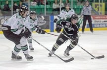 Okotoks Oilers forward Jon Turk meanders his way through a sea of Drayton Valley Thunder defencemen during the second period of the Oilers&#8217; 3-2 loss, Jan. 13 at