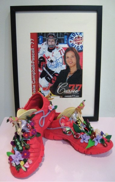 Pictured are Olympic hockey medalist Cassie Campbell&#8217;s shoes transformed into art by local artists Janifer Calvez and Alice Clarke. They are one of 12 pairs of shoes