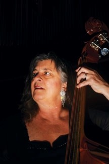 Bow Djangos band leader Tess Bassie is pictured with her double bass at the Jack Singer Concert Hall on Feb. 26 prior to a performance. Bassie will be in Okotoks this