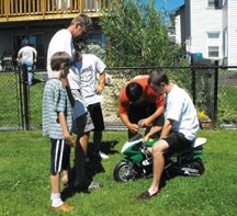 The Greenshields and some 2010 Okotoks Dawgs put together a minibike won by Okotoks Dawg Bret DeRooy at the Calgary Stampede. From left to right are, Matt Greenshields, Jamie 