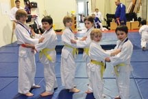 Six members of the Big Rock Judo Club in Okotoks practice their moves. They are, from left, Max Brown, Shion Crook, Scott Brown, Carys Streit, Hugo Brown and Tai Crook.