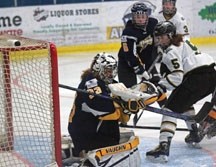Rocky Mountain Raiders&#8217; forward Amanda McLeod goes to the net in search of a rebound during the AMBFHL championship finals.