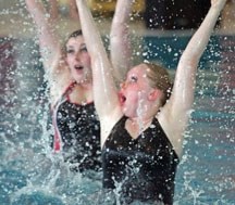 Okotoks Synchro Sea Queens Caylee Dzurka (front) and Meghan Cunningham perform the final routine at the Year End Water Show, April 29 at the Okotoks Pool.