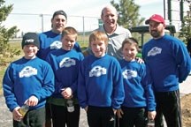 The Jacob Libbus rink meets with Canadian curling legend Kevin Martin outside the Saville Sports Centre in Edmonton. From left to right (back row) Brad MacInnis, Kevin