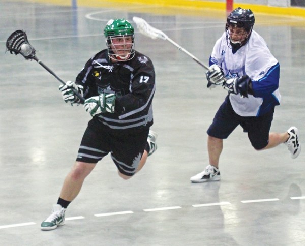 Okotoks Sr. Raider Danny Farmer loads up a shot in the slot after getting by a Calgary Moutaineer defender. The Raiders won the game 15-6, May 5 at Centennial Arena in