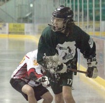 Okotoks Ice assistant captain and leading scorer Eric Antonchuk controls the ball during Tier II Junior B action against the Calgary Sabrecats.