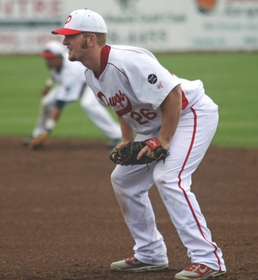 Okotoks Dawgs&#8217; first baseman Stetson Olson gets into fielding position during the Dawgs&#8217; Father&#8217;s Day game at Seaman Stadium.
