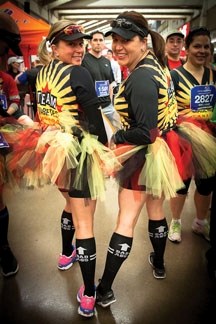 Okotoks endurance athletes Debbie Zelez and Elena Aitken line up decked out in Team Diabetes gear at the Calgary Half Marathon.