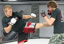 Nick Ring, seen here on the left sparring with Champions Creed Martial Arts training partner Brad Cardinal, expects his UFC 149 tilt with Court McGee to be decided in the