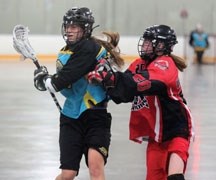 Okotoks Mustang Ally Bymak, left, and teammate Julia Porter were part of Team Alberta&#8217;s bronze medal performance at the 2012 Bantam Box Lacrosse National Championships