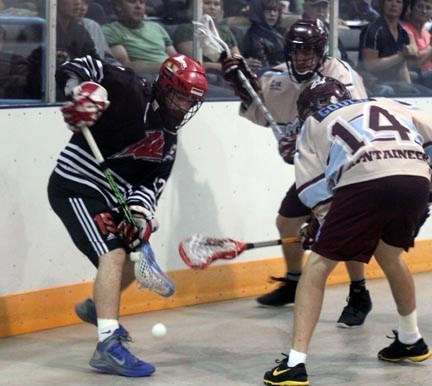 Okotoks Raider Jordan Daradick reaches for a loose ball during Game 7 of the Alberta Jr. A Lacrosse League finals in Indus on Aug. 14. The Calgary Mountaineers won 16-11 to