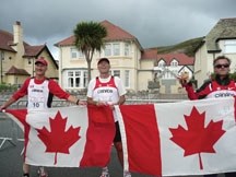 Okotoks runner Wayne Gaudet, middle, with Team Canada teammates Bruce Barleux and Dave Carver at the 2011 24-hour run Commonwealth championships. Gaudet will run in the