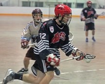 Okotoks Raider Jordan Getz gets in the open floor during Game 7 of the Alberta Jr. A Lacrosse League finals in Indus on Aug. 14. Calgary dumped Okotoks 16-11 to clinch the