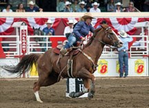 Barrel racer Lauren Byrne, here at the 2012 Calgary Stampede, will be travelling to three rodeos with fellow Okotokian Adel Hansen this weekend. Both competitors are close to 