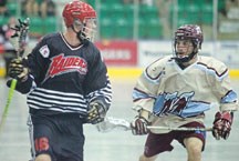 Okotoks Raider Cam Copland, left, temporarily joined the rival Calgary Mountaineers, pictured right, at the 2012 Minto Cup in Whitby, ON. The Alberta team went 0-3 at the