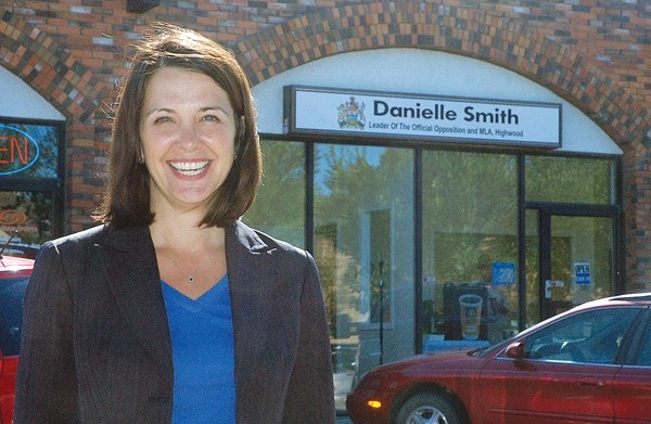 Highwood MLA Danielle Smith stands outside her Okotoks office last week. The Wildrose Party leader has two offices in the riding, one in Okotoks and a second in High River.