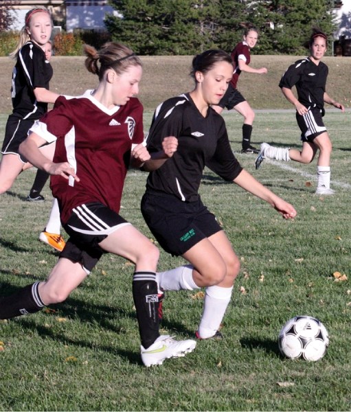 The Foothills Falcons and Holy Trinity Academy Knights, here competing during the 2011 season, have won the last five Foothills Athletic Council girls soccer titles.