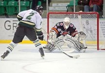 Okotoks Oilers&#8217; defenceman Drew Weich loads up a shot on Lloydminster Bobcats goalie Chase Martin during the first round of shots of the Oilers&#8217; 3-2 shootout