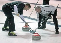 Team Libbus skip Mike Libbus, right, and lead Peter Keenan, here sweeping at the 2012 Southern Alberta showdown, have competed in three World Curling Tour events this season.
