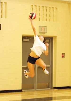 Holy Trinity Academy Knight Jill Lazic jumps up for a spike serve during a practice on Oct. 29. The Knights downed the Foothills Falcons in Foothills Athletic Council action