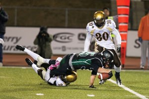 University of Saskatchewan Huskies receiver Charlie Power snags a pass against the University of Manitoba Bisons earlier this season. Power was switched from linebacker to