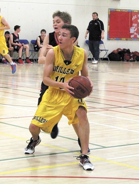 Oilfields Driller Cole Perrault controls the ball in their victory over the Chestermere JV Lakers in the Our Lady of the Snows tournament final on Jan. 12 in Canmore. The