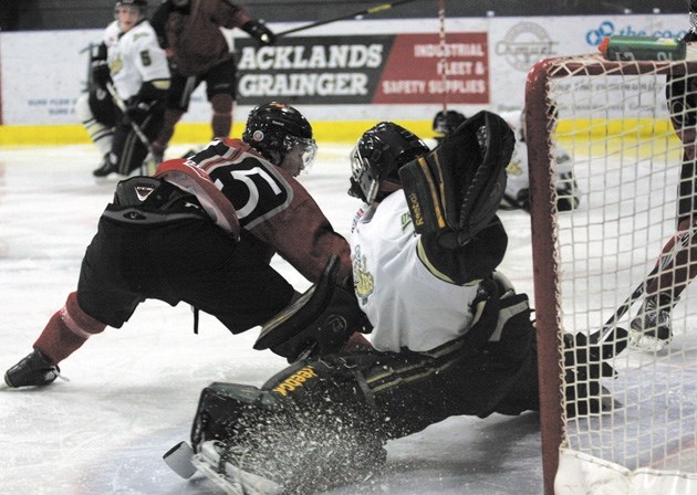 Okotoks Oilers goalie Jared D&#8217;Amico stretches to make a toe save on Bonnyville Pontiac Spencer Foo, Saturday night at the RJ Lalonde Arena in Bonnyville. The Oilers