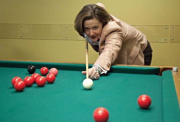 Alberta Premier Alison Redford plays a game of snooker during a stop at the Okotoks and District Seniors Centre on Feb. 1.