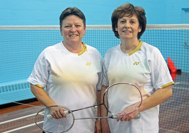 Okotoks badminton players Cheryl Griep and Shirley Pocock (left to right) pose at a training session at the Calgary Winter Club on Saturday. The duo will be competing in