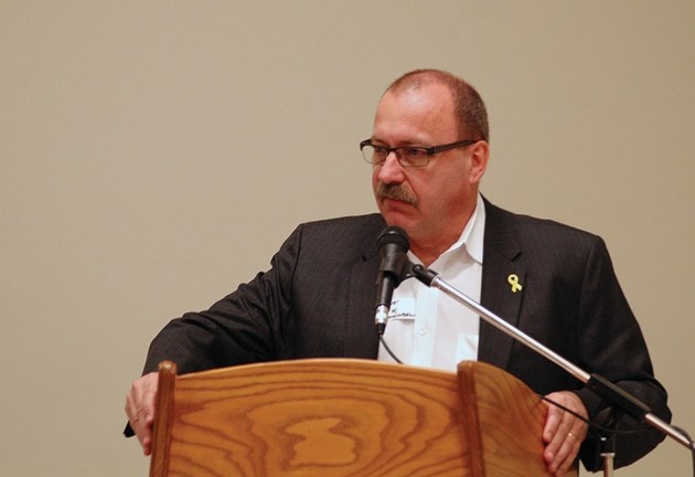 Alberta Transportation Minister Ric McIver speaks during a lunch event hosted by the Highwood Progressive Conservative Constituency Association on March 22 in Okotoks.