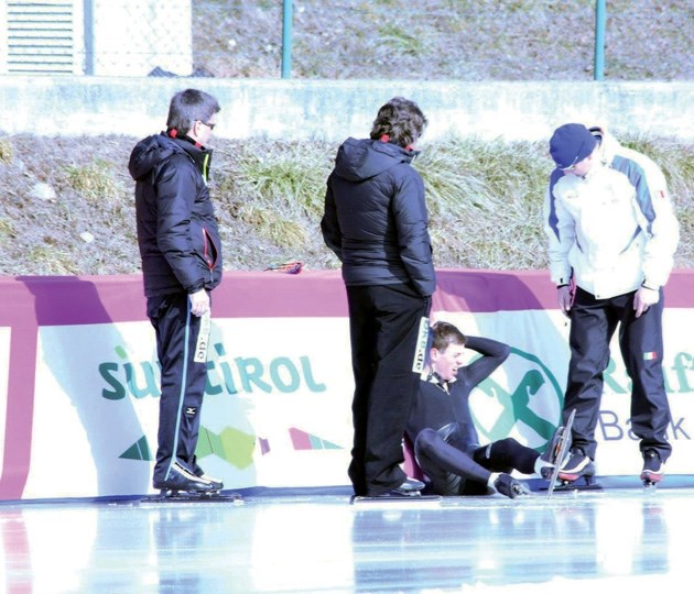 Cooper Hunter of DeWinton grabs his head after falling during a training run at the World Junior Speedskating championships in Italy in February.