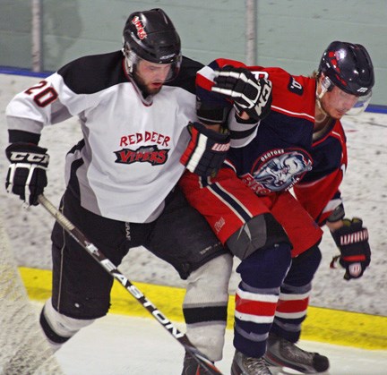 Red Deer Viper Colten Brule keeps Okotoks Bison Dillon Loomer to the outside during Game 3 of the HJHL finals. The Vipers are gunning for their third provincial banner in