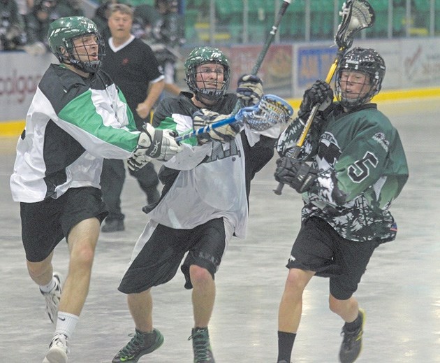 Okotoks Marauder Matt Westhaver gets ready to uncork a shot as two Saskatchewan Swat players struggled to get back in the play during Saskatoon&#8217;s 19-8 win Saturday at