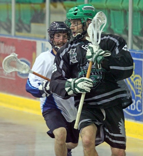 Okotoks Sr. Raider Matt Melnyk evades a Calgary Mountie defender last season. Melnyk will be joined by younger brother Tyler Melnyk, the Raiders&#8217; first overall pick in