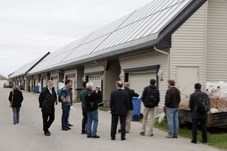 Represntatives from the Internation Engergy Agency Solar Heating and Cooling committee view Drake Landing&#8217;s solar technology during their tour on May 16.