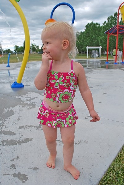 Two-year-old Keanna Young plays in the Okotoks Spray Park in 2011. The Foothills Lions Club Family Spray Park Committee hopes to have a similar park operating in Turner