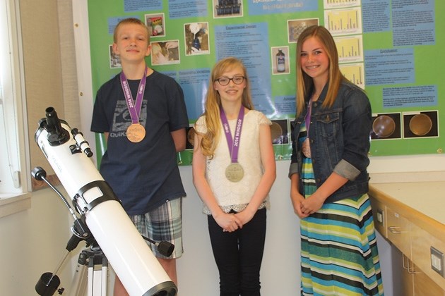 Red Deer Lake School students Ryan Peters, Brielle Lillywhite and Stephanie Dunham won medals at the Canada-Wide Science Fair in Windsor, ON. earlier this month.