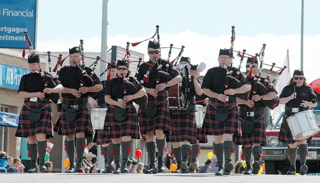 A pipe band marches during last year&#8217; s Black Diamond Parade. This year&#8217; s event takes place on June 8 at 10 a.m.