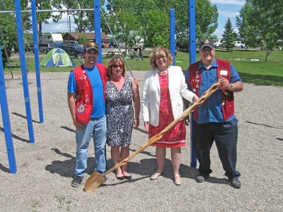 From the left, Foothills Lions Club Family Spray Park Committee chairman Barry Crane, Turner Valley Mayor Kelly Tuck, Calgary-Glenmore MLA Linda Johnson and Foothills Lions