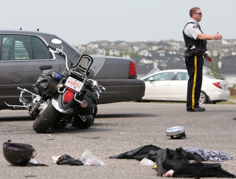 RCMP direct traffic at the scene of a second motorcycle accident on July 18 at Southridge Drive and Highway 7