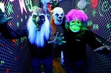 A group of frightening creatures prepare to scare the hundreds of people expected to file through the Legion of Monsters spook house in the Turner Valley Legion Oct. 25-30