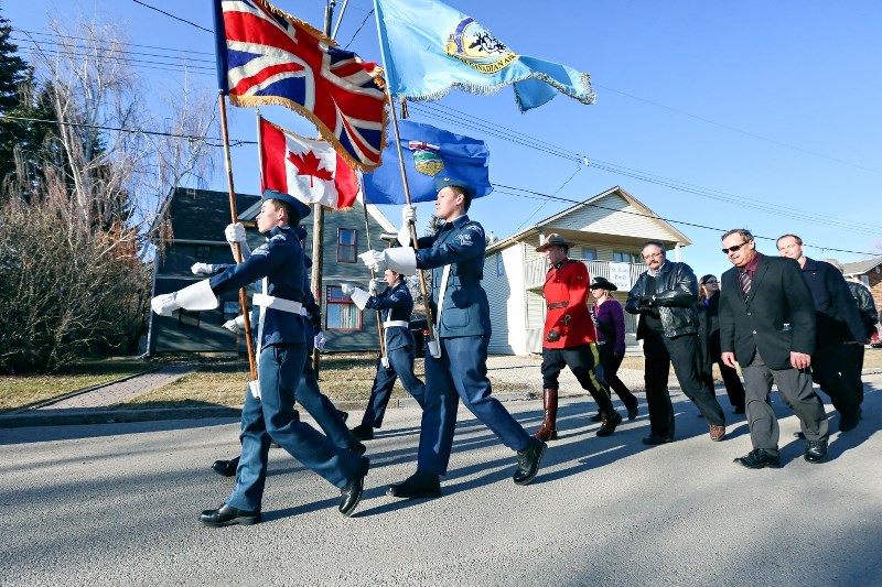 Cadets, RCMP and local dignitaries march in the Birth of a Nation day parade in Okotoks last year. The day celebrates Canada&#8217;s contribution at Vimy Ridge.